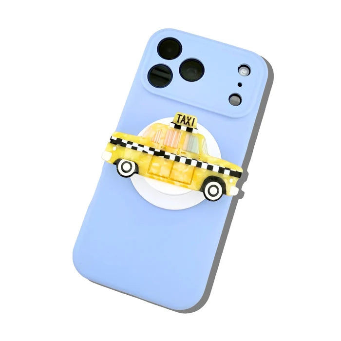 A phone holder yellow taxi design on a light blue phone case.