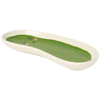 Pickle-shaped tray with green top and white base on a white background